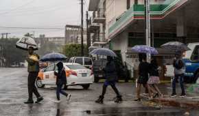 Autoridades pidieron a capitalinos portar paraguas e impermeables