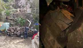 Especialistas en la demolición de rocas trabajan para convertir las piedras en un muro de amortiguamiento