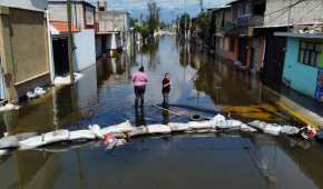 Las familias de Chalco lamentan los bienes perdidos en la inundación